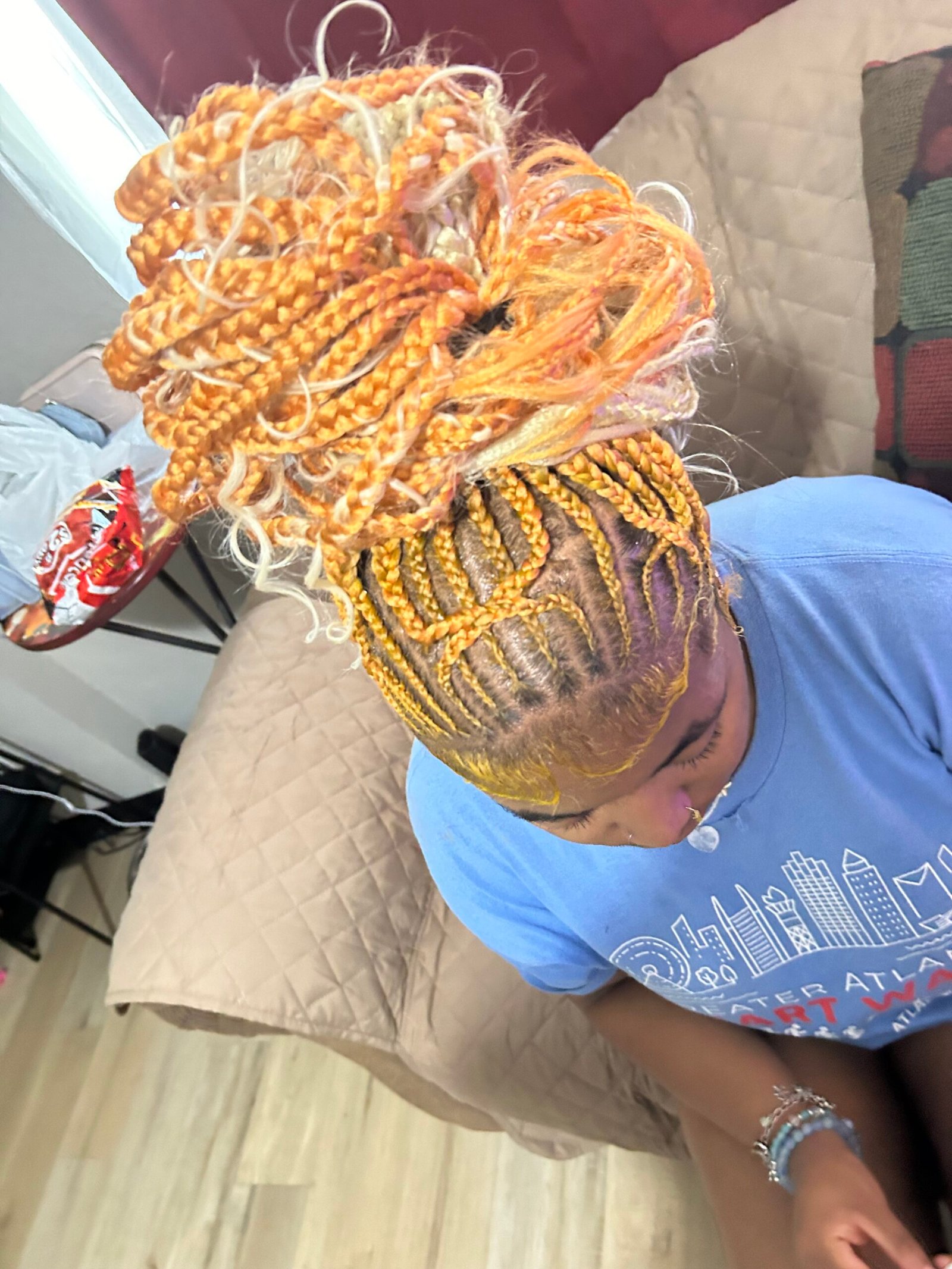 Nae TheStylist — orange & blonde braided bun