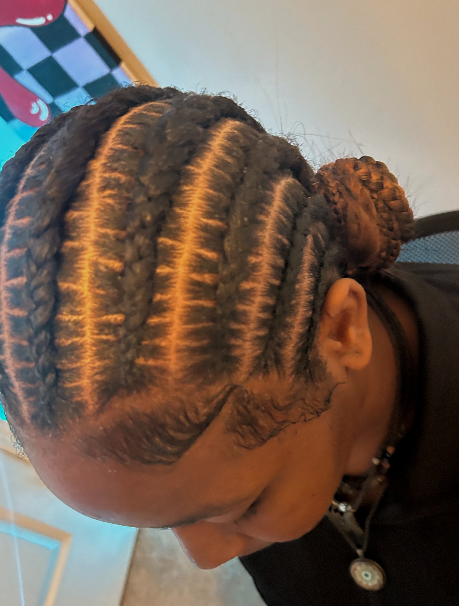 Nae TheStylist — cornrows with braided bun